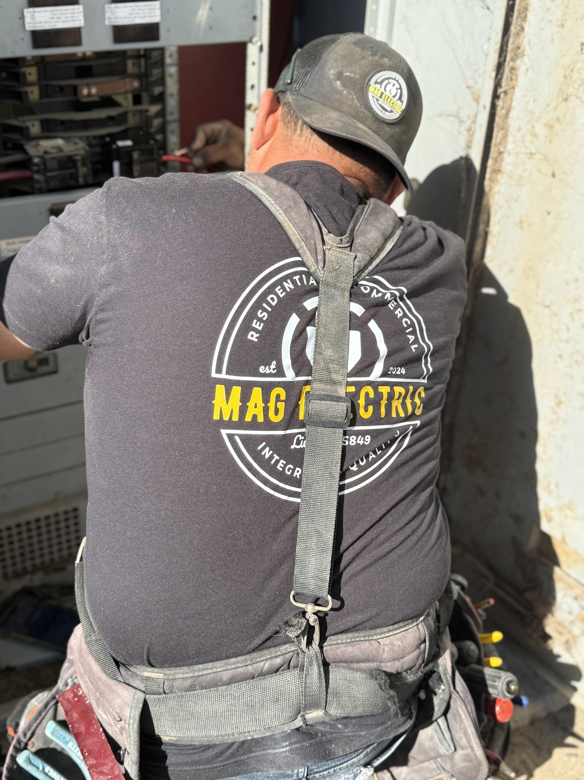 Electrician working on residential electrical repair Santa Maria CA MAG Electric licensed