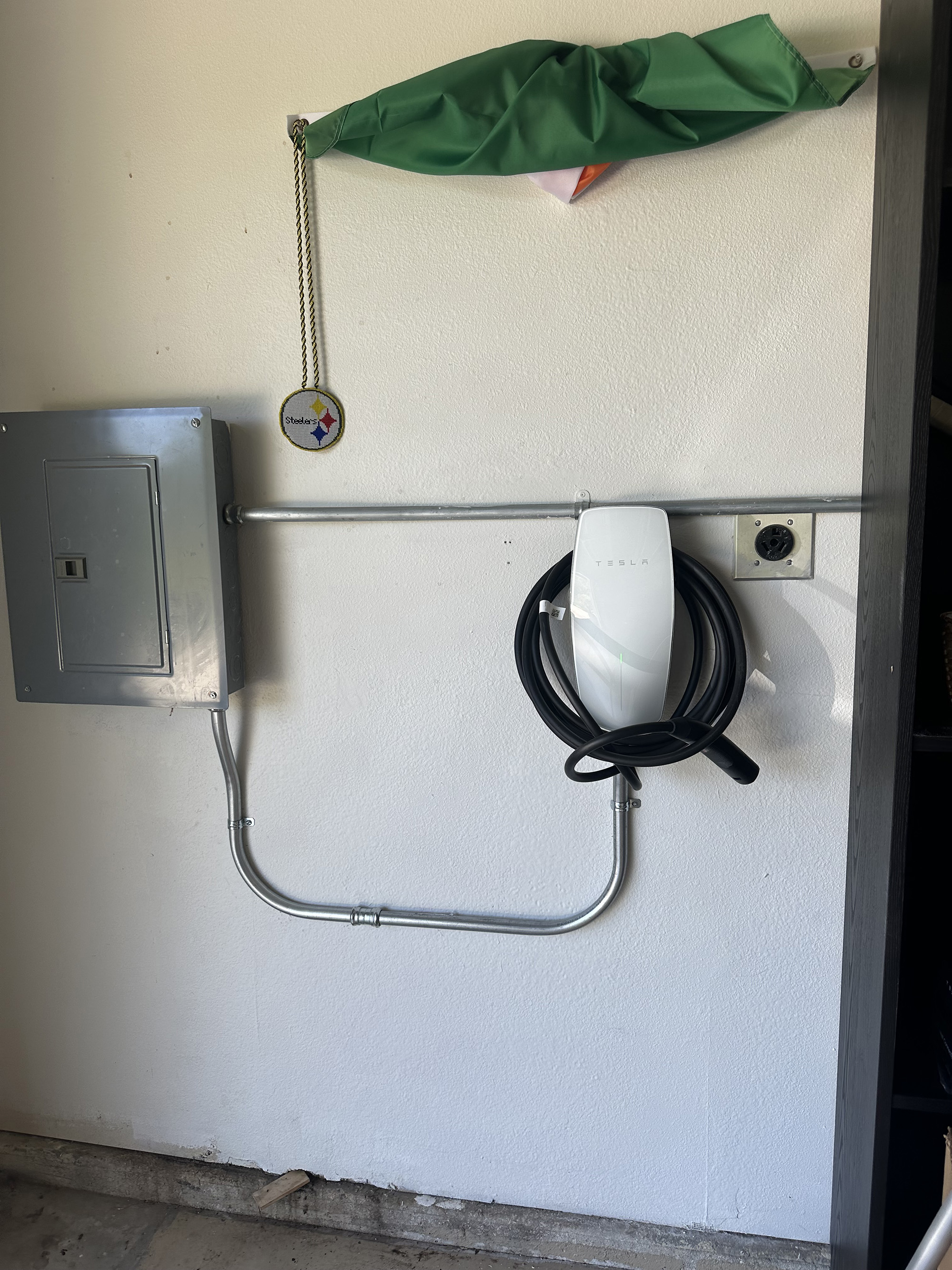 Tesla Wall Connector EV charger installed next to new 200A panel Santa Maria CA MAG Electric